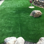 Artificial turf grass lawn seam needing repairs